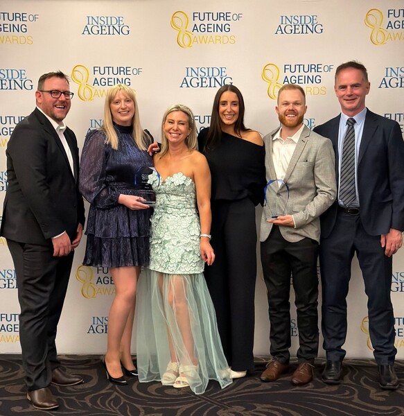 VMCH team members in front of the media wall at The Future of Ageing Awards 2026